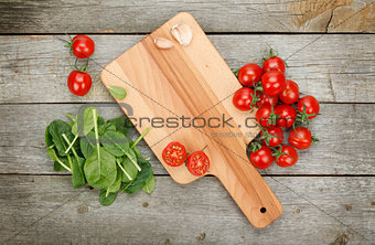 Cherry tomatoes on wooden table