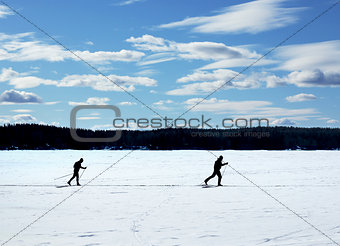 Nordic skiing on frozen lake