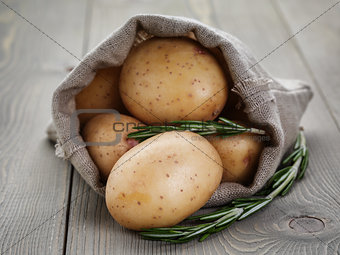 baby potatoes in sack bag with rosemary