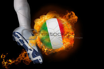 Football player kicking flaming italy ball