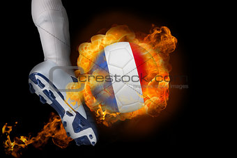 Football player kicking flaming france ball