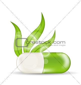 Natural medical pill with green leaves