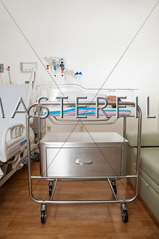 Newborn baby in hospital neonatal bed