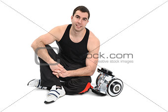 young man posing with dumbbell