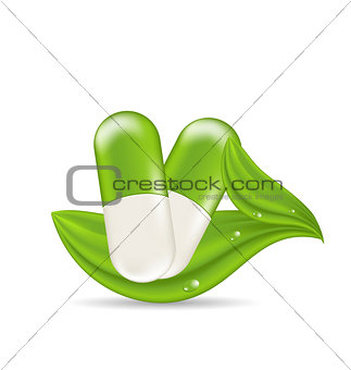 Natural medical pills with green leaves, isolated on white backg