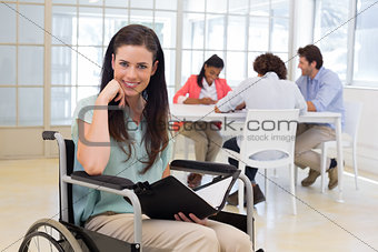 Attractive disabled businesswoman at work