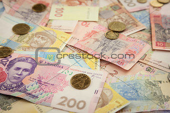 New bright ukrainian hrivnas money banknots and coins background