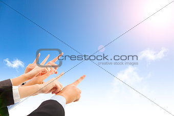 business people hands with blue sky background