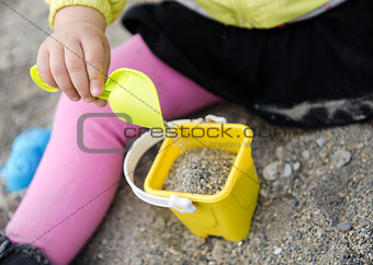 Baby playing on the beach