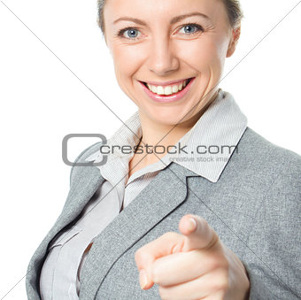 Portrait of young business woman pointing finger at viewer