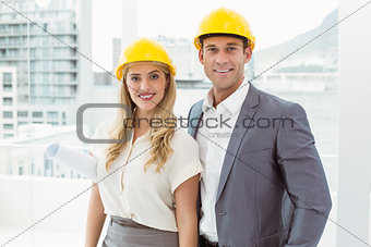 Portrait of colleagues wearing hard hats