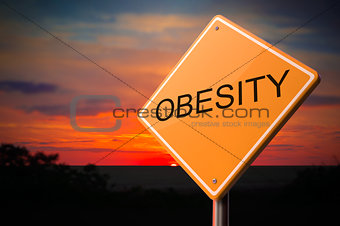Obesity Inscription on Warning Road Sign.
