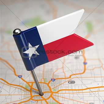 Texas Small Flag on a Map Background.