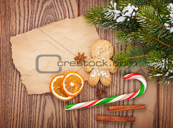 Christmas food and decor with snow fir tree