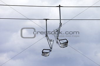 Chair-lift and overcast sky
