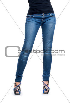 female body in blue jeans, isolated on white