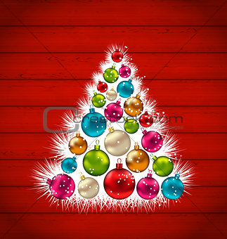 Abstract Christmas tree and colorful balls on wooden background