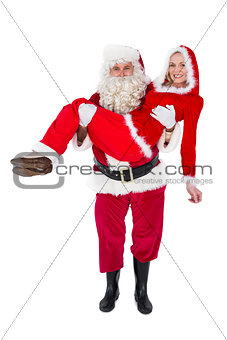 Santa and Mrs Claus smiling at camera
