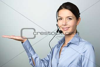 Smiling woman doing telemarketing