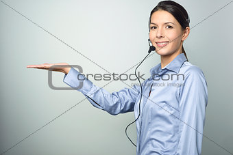 Smiling woman doing telemarketing