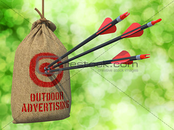 Outdoor Advertising - Arrows Hit in Red Target.