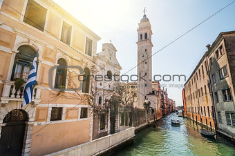 Spring view in sunny day of San Giorgio dei Greci with campanile on Rio del Greci, Venice, Veneto, Italy