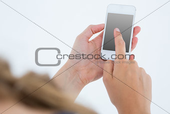 Woman using her smartphone