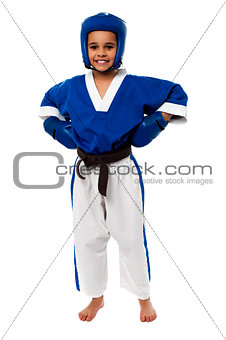 Smilng karate kid ready to fight out
