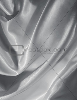 Smooth elegant grey silk or satin as background 