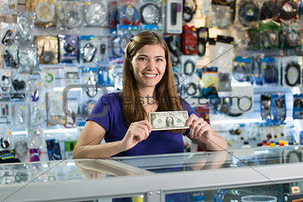 Happy Female Computer Shop Owner Showing First Dollar Earn