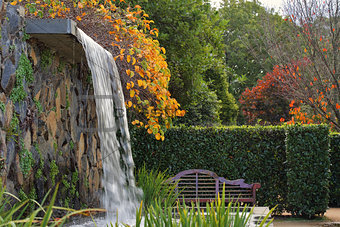 Zen garden with waterfall in Autumn