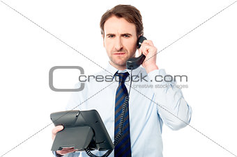 Business professional attending call