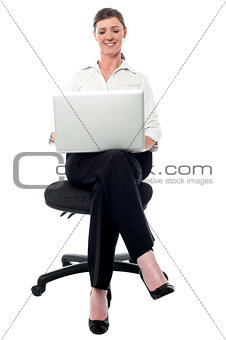 Corporate lady working on her laptop
