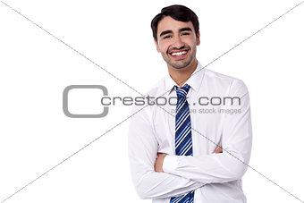 Smiling male executive posing with confidence