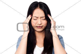 Young girl having headache