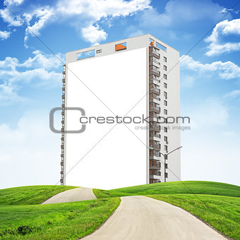 Building under blue sky with road