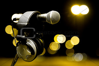 Headphones and microphone on the stage