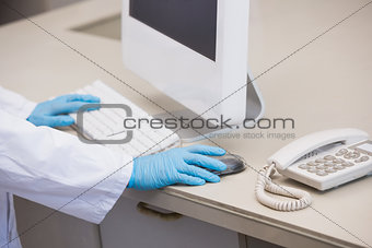 Scientist working with computer