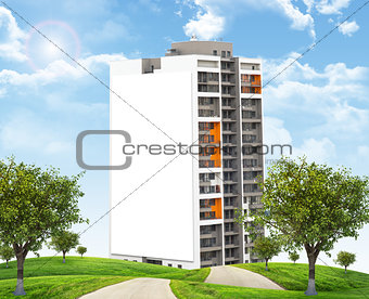High-rise building under blue sky with road
