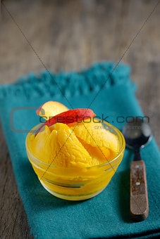 Closeup of a bowl of mango sorbet