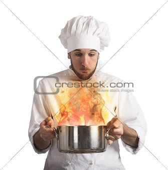 Chef blowing burnt food