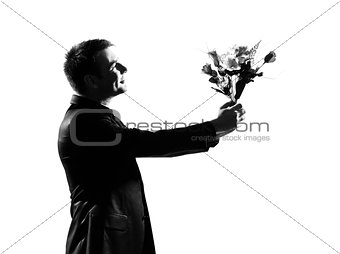 silhouette one man holding offering  flowers bouquet