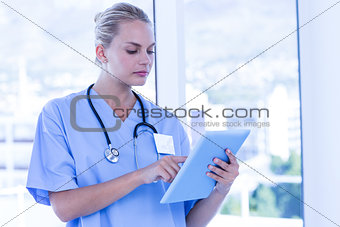 Nurse using her tablet pc