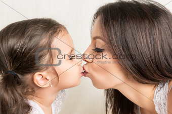 Portrait of happy mother and  daughter 