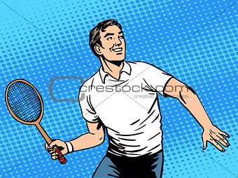 Handsome man playing tennis