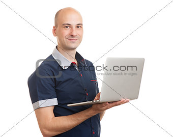 smiling bald young man with laptop