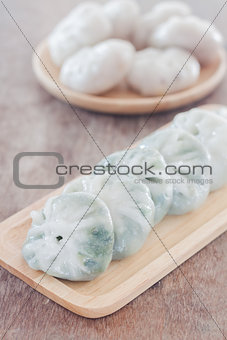 Chinese leek steamed dessert on wooden table