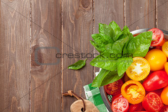 Fresh colorful tomatoes and basil