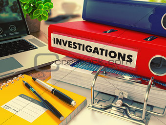 Red Office Folder with Inscription Investigations.