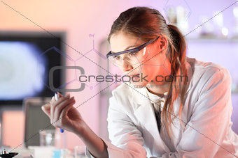 Life science researcher working in laboratory.